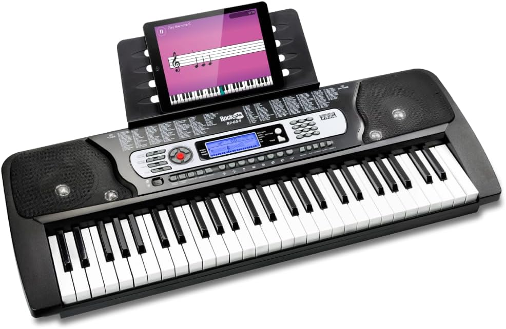 RockJam RJ654 54-key beginner keyboard piano with note stickers applied to the keys